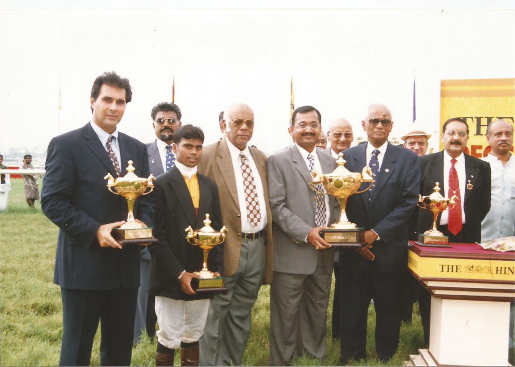 Dallas Todywalla, jockey B Prakash, Dr M A M Ramaswamy & Mr M A M R Muthiah with their trophies presented to them by Mr Surender Reddy, Chairman, Hyderabad Race Club